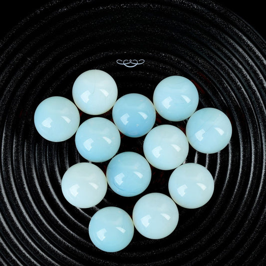 Protein glass spheres